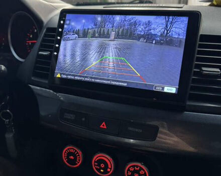 Чорний Міцубісі Lancer, об'ємом двигуна 2 л та пробігом 249 тис. км за 6500 $, фото 16 на Automoto.ua