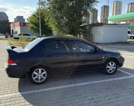 Чорний Міцубісі Lancer, об'ємом двигуна 1.6 л та пробігом 364 тис. км за 3000 $, фото 6 на Automoto.ua