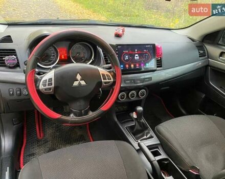 Чорний Міцубісі Lancer, об'ємом двигуна 2 л та пробігом 237 тис. км за 7500 $, фото 16 на Automoto.ua