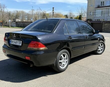 Чорний Міцубісі Lancer, об'ємом двигуна 1.6 л та пробігом 217 тис. км за 4600 $, фото 2 на Automoto.ua