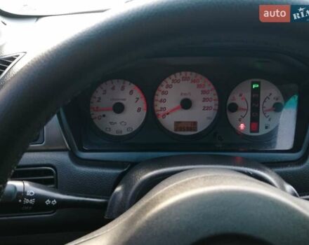 Чорний Міцубісі Lancer, об'ємом двигуна 1.58 л та пробігом 286 тис. км за 4950 $, фото 13 на Automoto.ua