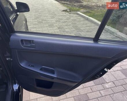 Чорний Міцубісі Lancer, об'ємом двигуна 1.5 л та пробігом 184 тис. км за 6000 $, фото 15 на Automoto.ua