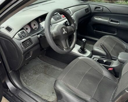 Чорний Міцубісі Lancer, об'ємом двигуна 1.6 л та пробігом 220 тис. км за 3600 $, фото 8 на Automoto.ua