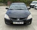 Чорний Міцубісі Lancer, об'ємом двигуна 1.6 л та пробігом 198 тис. км за 2842 $, фото 1 на Automoto.ua