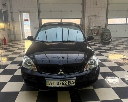 Чорний Міцубісі Lancer, об'ємом двигуна 1.6 л та пробігом 26000 тис. км за 3200 $, фото 12 на Automoto.ua
