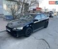 Чорний Міцубісі Lancer, об'ємом двигуна 2 л та пробігом 319 тис. км за 6800 $, фото 1 на Automoto.ua