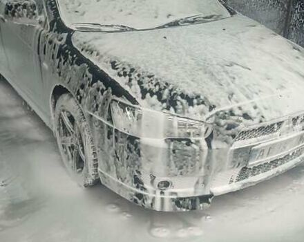 Черный Мицубиси Лансер, объемом двигателя 2 л и пробегом 217 тыс. км за 7000 $, фото 23 на Automoto.ua