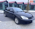 Чорний Міцубісі Lancer, об'ємом двигуна 1.58 л та пробігом 385 тис. км за 4500 $, фото 1 на Automoto.ua