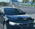 Чорний Міцубісі Lancer, об'ємом двигуна 2 л та пробігом 230 тис. км за 5500 $, фото 1 на Automoto.ua