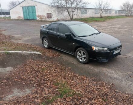Чорний Міцубісі Lancer, об'ємом двигуна 2 л та пробігом 232 тис. км за 5000 $, фото 6 на Automoto.ua
