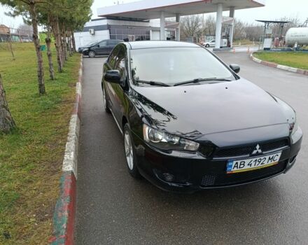 Черный Мицубиси Лансер, объемом двигателя 2 л и пробегом 200 тыс. км за 5100 $, фото 6 на Automoto.ua