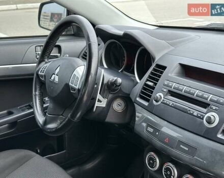 Чорний Міцубісі Lancer, об'ємом двигуна 2 л та пробігом 199 тис. км за 7900 $, фото 19 на Automoto.ua
