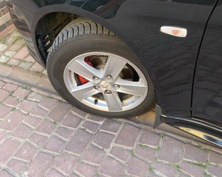 Черный Мицубиси Лансер, объемом двигателя 2 л и пробегом 210 тыс. км за 7000 $, фото 7 на Automoto.ua