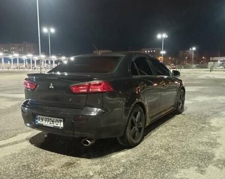 Черный Мицубиси Лансер, объемом двигателя 2 л и пробегом 240 тыс. км за 6400 $, фото 3 на Automoto.ua