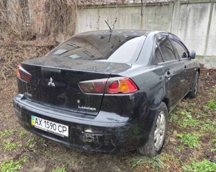 Черный Мицубиси Лансер, объемом двигателя 1.5 л и пробегом 300 тыс. км за 2500 $, фото 1 на Automoto.ua