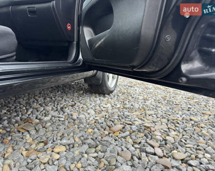 Черный Мицубиси Лансер, объемом двигателя 1.58 л и пробегом 202 тыс. км за 4100 $, фото 26 на Automoto.ua