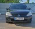 Чорний Міцубісі Lancer, об'ємом двигуна 1.6 л та пробігом 240 тис. км за 3024 $, фото 1 на Automoto.ua