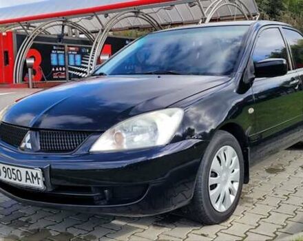 Міцубісі Lancer 2008 у Тернополі на Automoto.ua Чорний Міцубісі Lancer, об'ємом двигуна 1.58 л та пробігом 182 тис. км за 5600 $, фото 7 на Automoto.ua