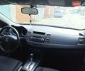 Черный Мицубиси Лансер, объемом двигателя 1.5 л и пробегом 223 тыс. км за 6499 $, фото 3 на Automoto.ua