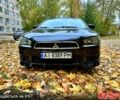 Чорний Міцубісі Lancer, об'ємом двигуна 2 л та пробігом 245 тис. км за 5500 $, фото 1 на Automoto.ua