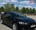 Черный Мицубиси Лансер, объемом двигателя 2 л и пробегом 280 тыс. км за 4999 $, фото 1 на Automoto.ua