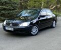 Чорний Міцубісі Lancer, об'ємом двигуна 1.6 л та пробігом 240 тис. км за 3300 $, фото 1 на Automoto.ua