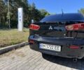 Черный Мицубиси Лансер, объемом двигателя 1.5 л и пробегом 3 тыс. км за 6000 $, фото 3 на Automoto.ua