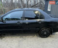 Чорний Міцубісі Lancer, об'ємом двигуна 1.6 л та пробігом 277 тис. км за 3900 $, фото 15 на Automoto.ua
