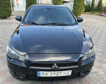 Черный Мицубиси Лансер, объемом двигателя 2 л и пробегом 270 тыс. км за 5200 $, фото 4 на Automoto.ua
