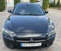 Черный Мицубиси Лансер, объемом двигателя 2 л и пробегом 270 тыс. км за 5200 $, фото 4 на Automoto.ua