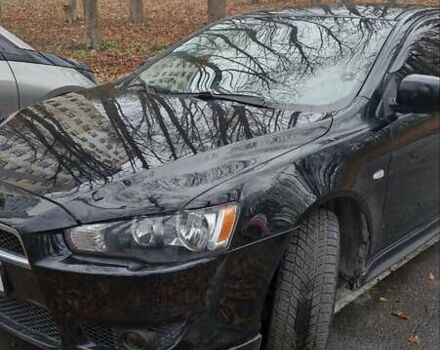 Чорний Міцубісі Lancer, об'ємом двигуна 2 л та пробігом 302 тис. км за 7200 $, фото 4 на Automoto.ua