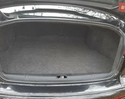 Черный Мицубиси Лансер, объемом двигателя 2 л и пробегом 63 тыс. км за 8000 $, фото 3 на Automoto.ua