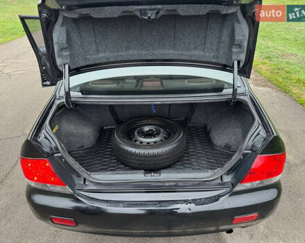 Чорний Міцубісі Lancer, об'ємом двигуна 1.6 л та пробігом 200 тис. км за 4500 $, фото 9 на Automoto.ua