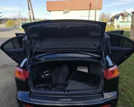 Міцубісі Lancer 2008 у Києві на Automoto.ua Чорний Міцубісі Lancer, об'ємом двигуна 2 л та пробігом 196 тис. км за 5500 $, фото 21 на Automoto.ua