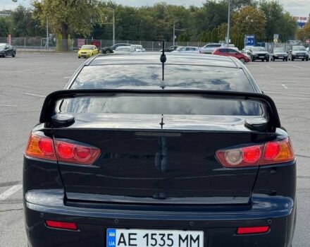 Черный Мицубиси Лансер, объемом двигателя 2 л и пробегом 297 тыс. км за 7500 $, фото 3 на Automoto.ua