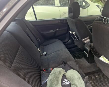 Черный Мицубиси Лансер, объемом двигателя 1.6 л и пробегом 243 тыс. км за 2900 $, фото 4 на Automoto.ua