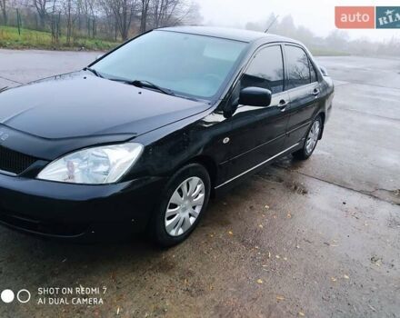 Мицубиси Лансер 2008 в Прилуках на Automoto.ua Черный Мицубиси Лансер, объемом двигателя 1.58 л и пробегом 219 тыс. км за 4900 $, фото 7 на Automoto.ua