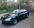 Чорний Міцубісі Lancer, об'ємом двигуна 1.6 л та пробігом 240 тис. км за 4999 $, фото 1 на Automoto.ua