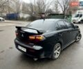 Черный Мицубиси Лансер, объемом двигателя 2 л и пробегом 217 тыс. км за 7000 $, фото 31 на Automoto.ua