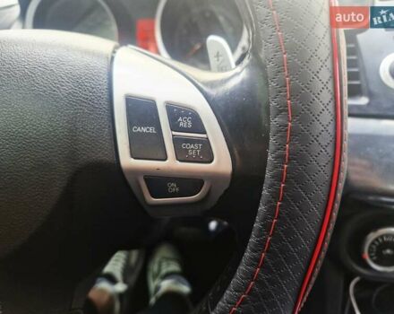 Чорний Міцубісі Lancer, об'ємом двигуна 2 л та пробігом 240 тис. км за 7850 $, фото 27 на Automoto.ua