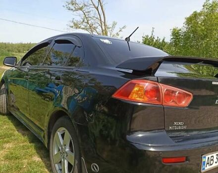 Чорний Міцубісі Lancer, об'ємом двигуна 2 л та пробігом 205 тис. км за 6800 $, фото 6 на Automoto.ua