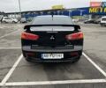 Черный Мицубиси Лансер, объемом двигателя 1.5 л и пробегом 225 тыс. км за 5100 $, фото 9 на Automoto.ua