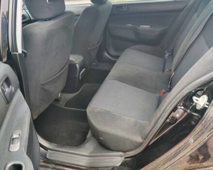 Чорний Міцубісі Lancer, об'ємом двигуна 1.6 л та пробігом 257 тис. км за 4200 $, фото 3 на Automoto.ua