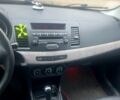 Черный Мицубиси Лансер, объемом двигателя 1.5 л и пробегом 221 тыс. км за 6400 $, фото 5 на Automoto.ua