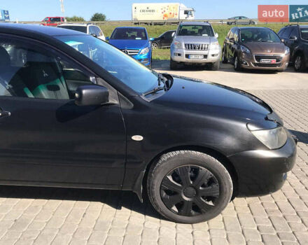 Мицубиси Лансер 2008 в Львове на Automoto.ua Черный Мицубиси Лансер, объемом двигателя 1.6 л и пробегом 356 тыс. км за 4590 $, фото 8 на Automoto.ua