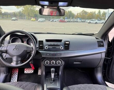 Черный Мицубиси Лансер, объемом двигателя 2 л и пробегом 297 тыс. км за 7500 $, фото 6 на Automoto.ua