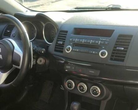 Чорний Міцубісі Lancer, об'ємом двигуна 2 л та пробігом 134 тис. км за 29034 $, фото 4 на Automoto.ua