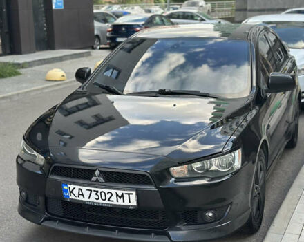 Черный Мицубиси Лансер, объемом двигателя 2 л и пробегом 295 тыс. км за 7000 $, фото 8 на Automoto.ua