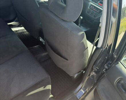 Черный Мицубиси Лансер, объемом двигателя 1.58 л и пробегом 205 тыс. км за 4500 $, фото 7 на Automoto.ua