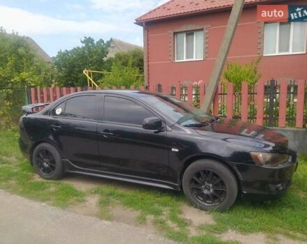 Чорний Міцубісі Lancer, об'ємом двигуна 2 л та пробігом 183 тис. км за 5000 $, фото 5 на Automoto.ua